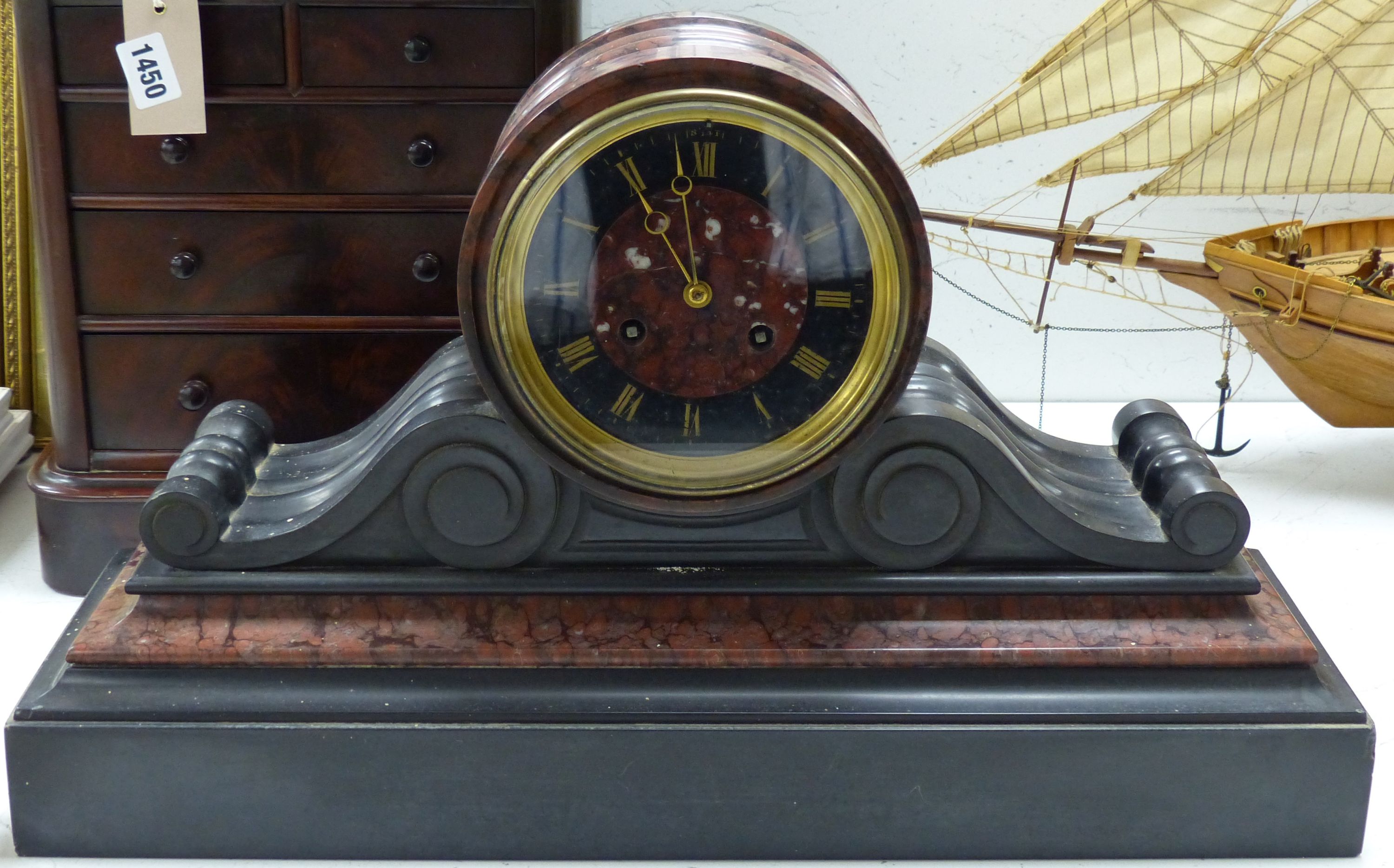 A Victorian black slate and rouge marble mantel clock (no key or pendulum), length 53cm